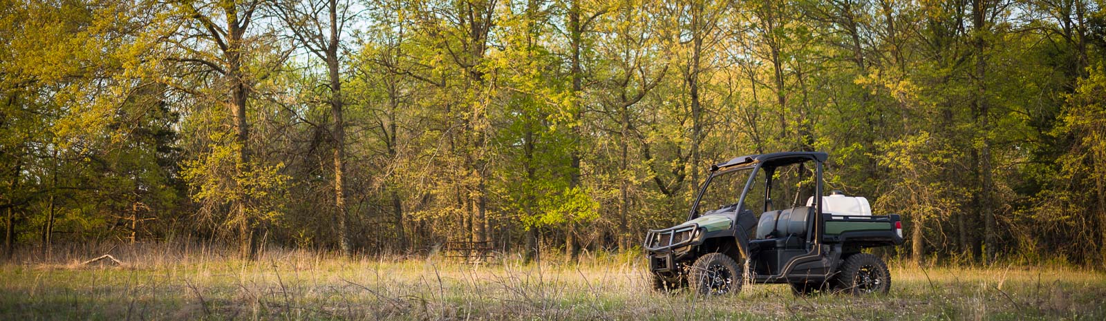 All terrain vehicle parked in Kansas woodland